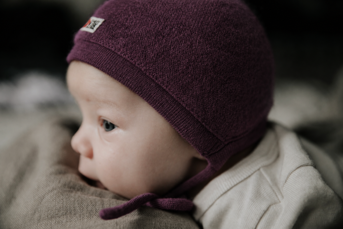 Baby in der Trage anziehen: wie viele Schichten es im Winter wirklich braucht