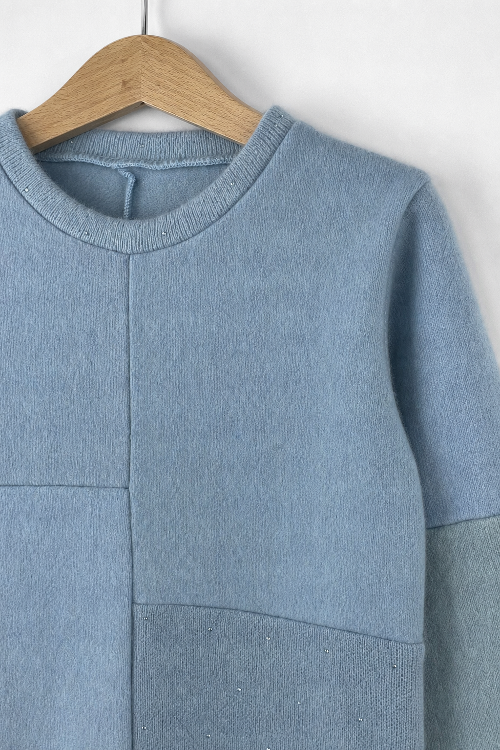 Detailaufnahme des Kaschmir No Waste Pullovers für Kinder in Größe 98/104