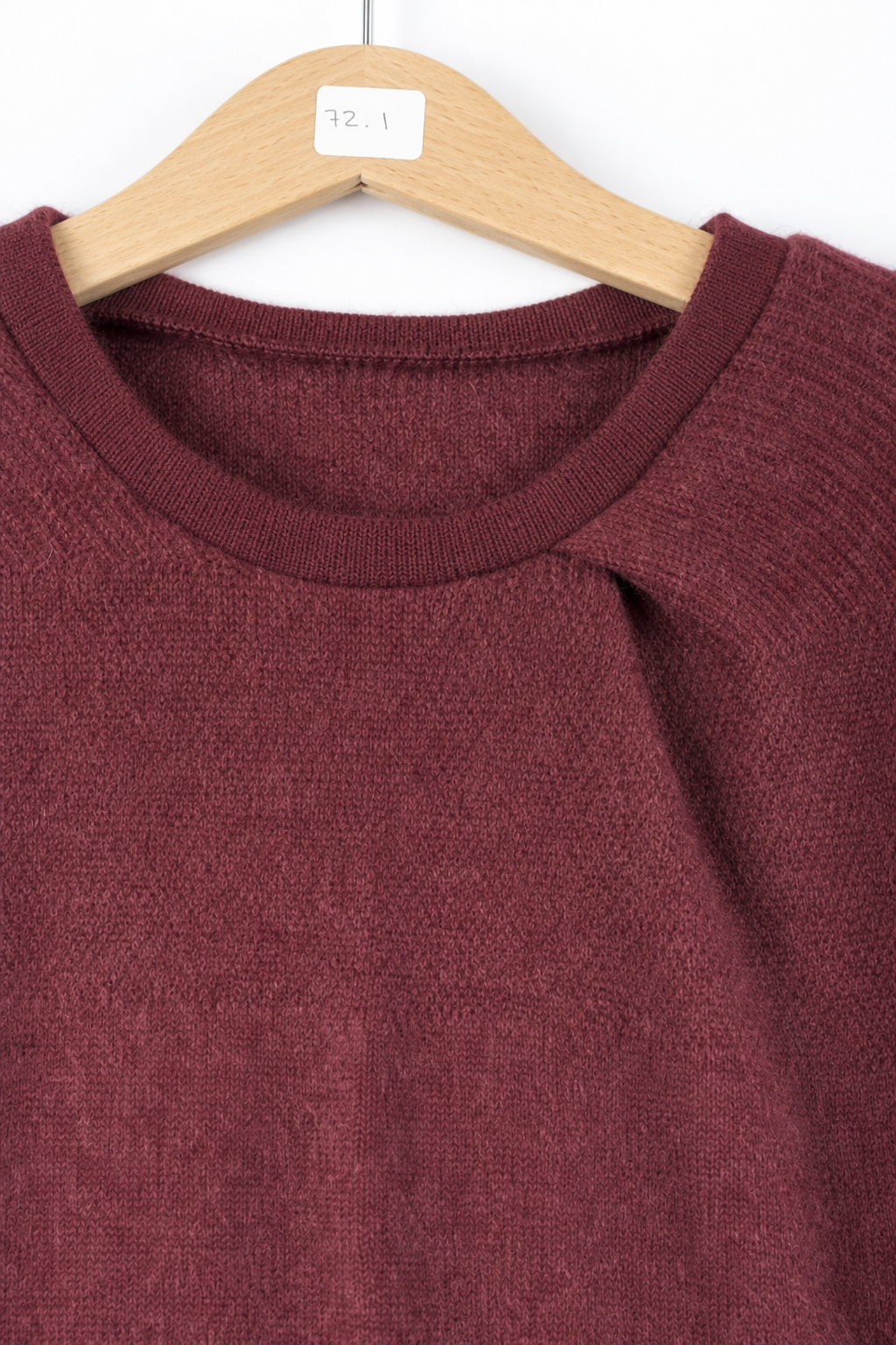 Detailaufnahme des Kaschmirpullovers in Rot, Größe 122/128