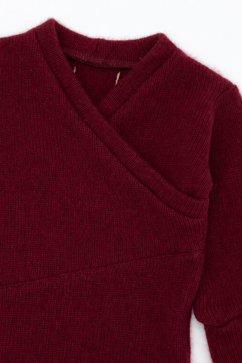 Detailaufnahme des Kaschmir Baby Longsleeves in Größe 50/56