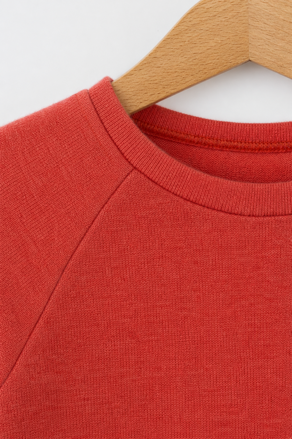 Detailaufnahme des Kaschmir Kinder Longsleeves in Rosa, Größe 86/92