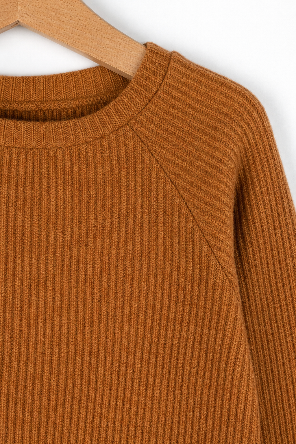 Detailaufnahme des Kaschmir Kinder Longsleeves in Orange, Größe 86/92