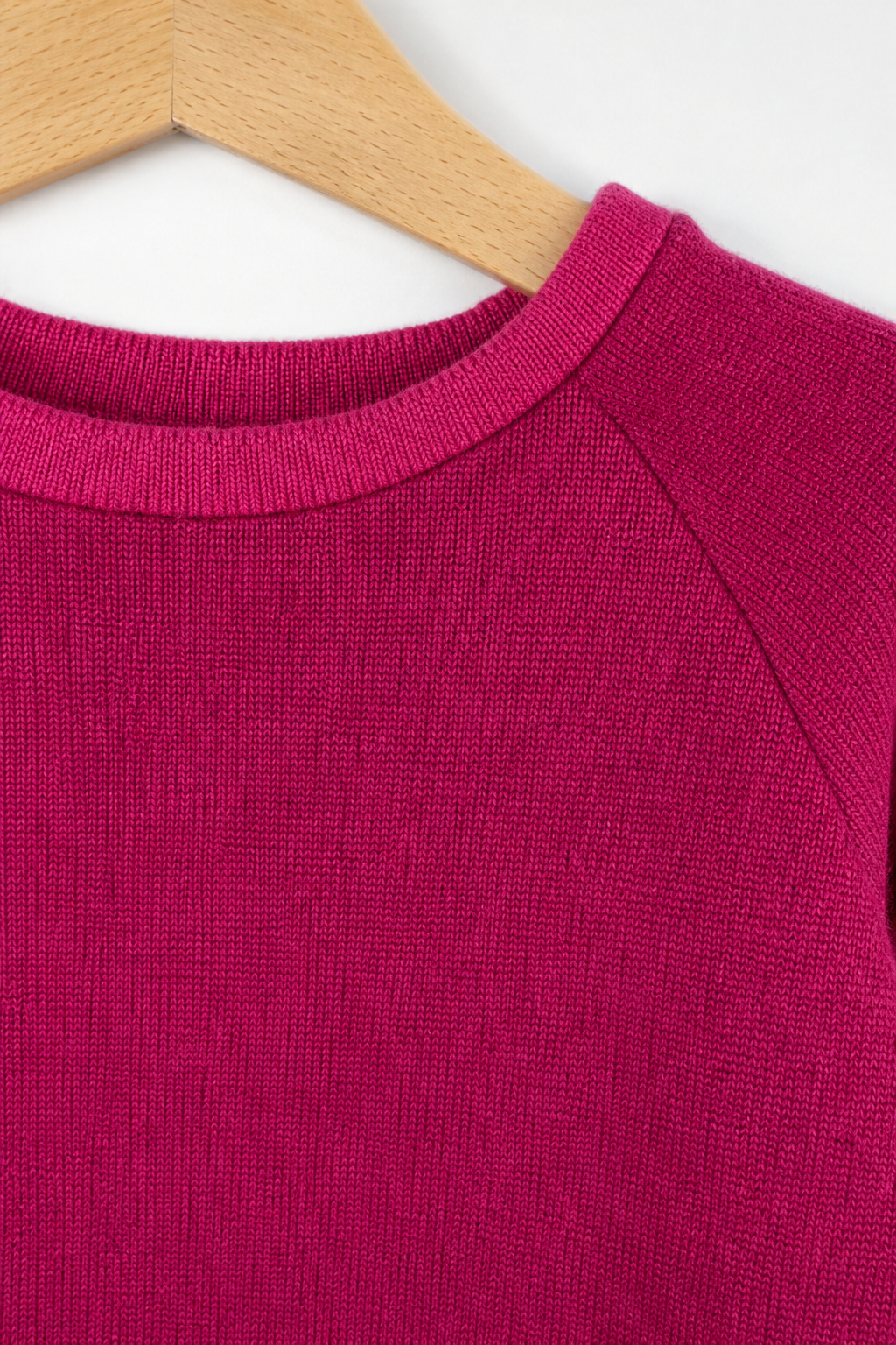 Detailaufnahme des Kaschmir Kinder Longsleeves in Pink, Größe 122/128