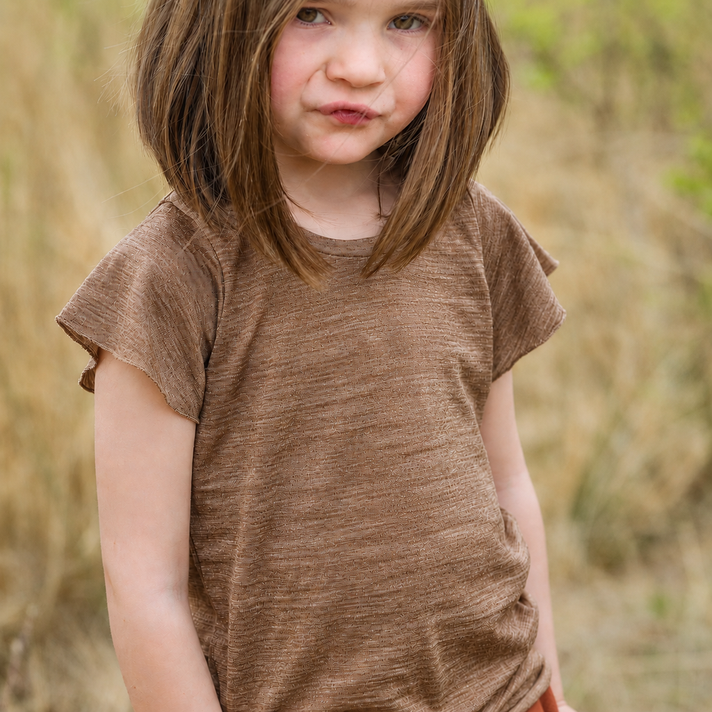 Sommermerino Kinderbluse mit Flügelärmeln