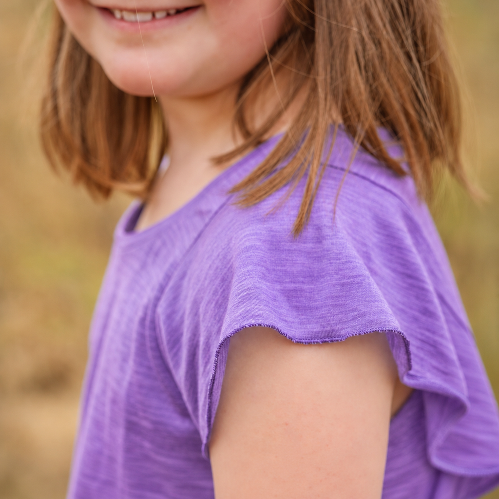 Sommermerino Kinderbluse mit Flügelärmeln