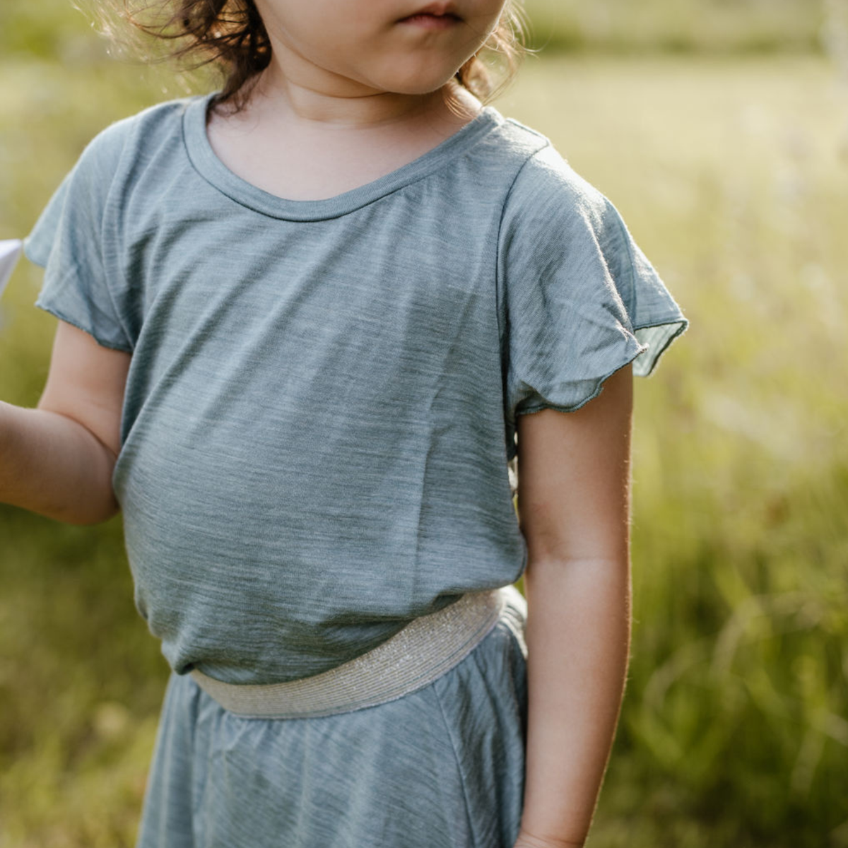 Sommermerino Kinderbluse mit Flügelärmeln