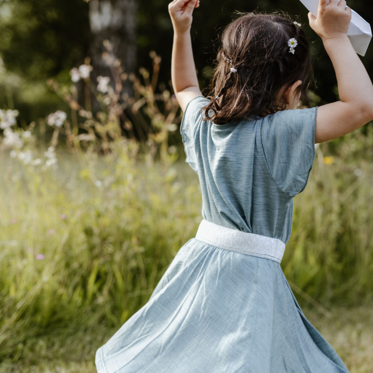Sommermerino Kinderbluse mit Flügelärmeln